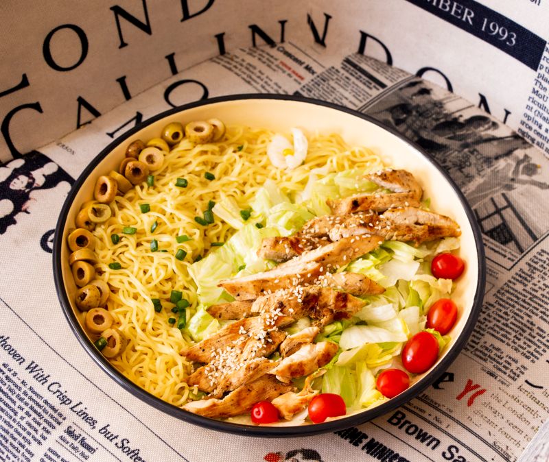rice noodle salad with shredded chicken and crushed peanuts