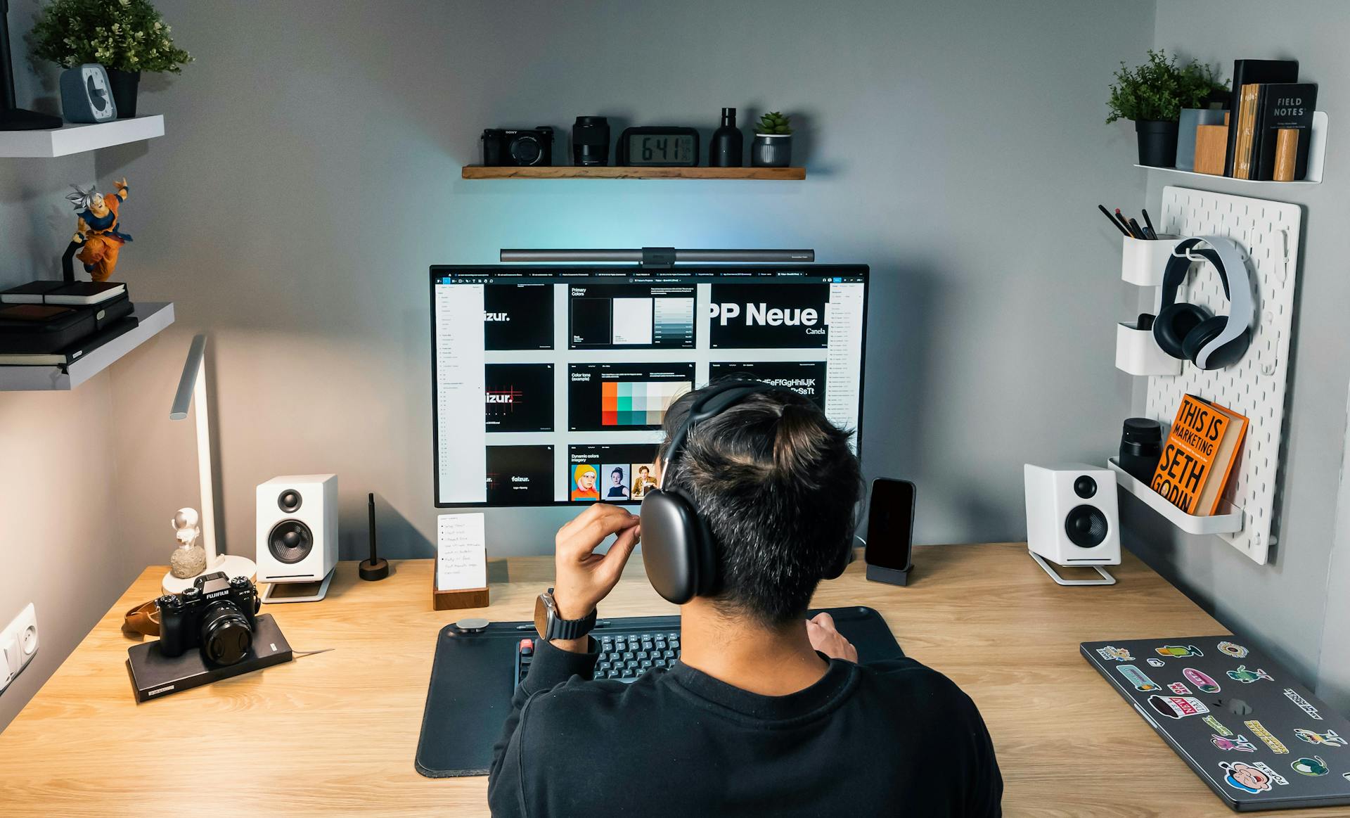 Modern Home Office Setup with Computer and Headphones