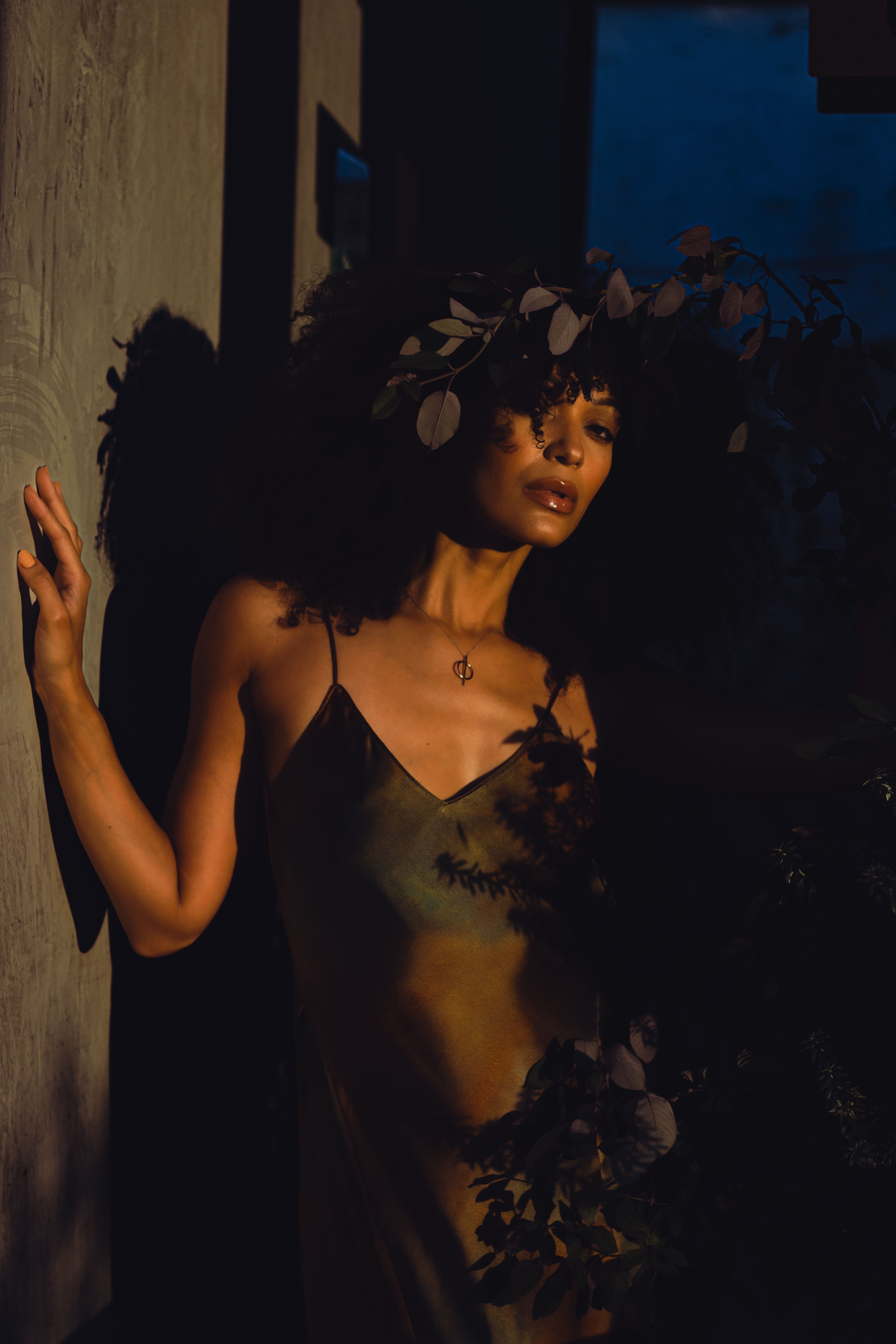 Moody Portrait of Woman in Dim Lighting · Free Stock Photo