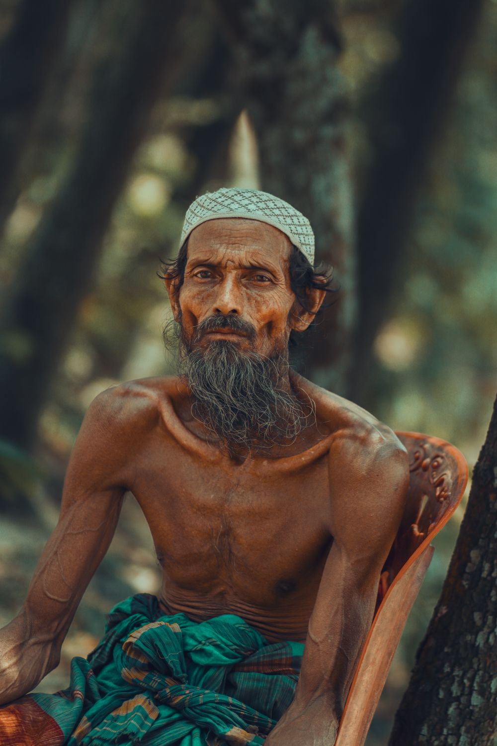 Portrait of an Elderly Man in Traditional Attire · Free Stock Photo