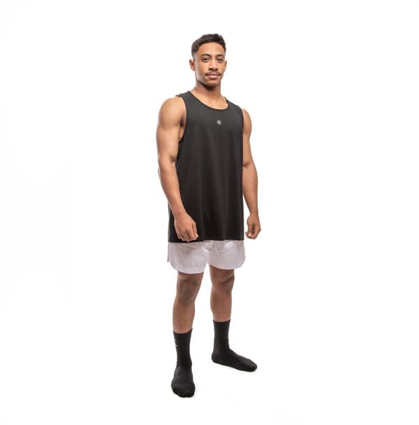 Model wearing training shorts — photo by INFECTED Store on Pexels
