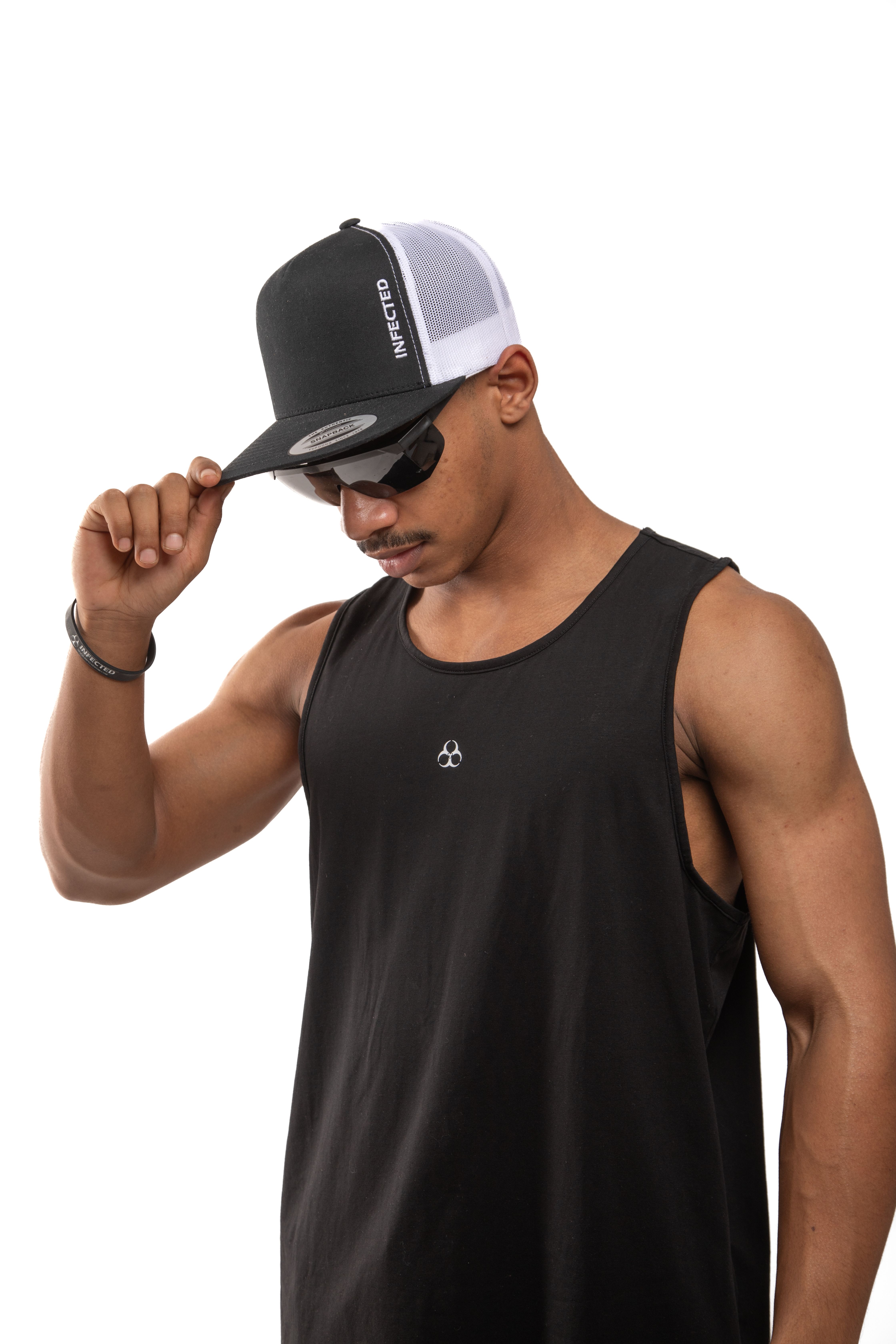 Stylish Fit Man in Black Tank Top and Cap · Free Stock Photo