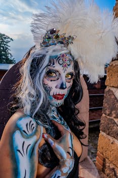 Stunning Catrina makeup portrait with elaborate costume, celebrating Dia de los Muertos traditions.