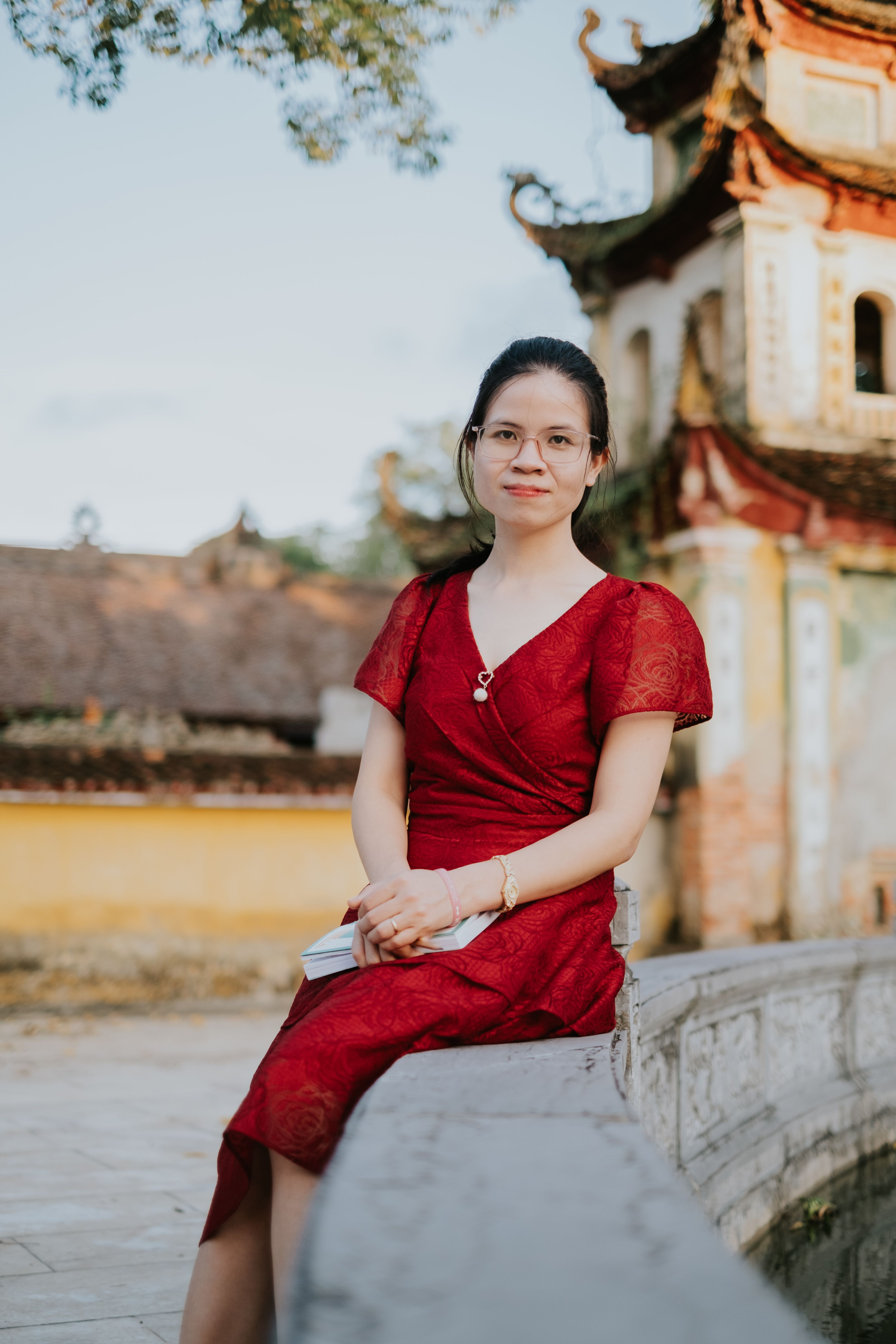 Portrait of Woman in Traditional Red Dress at Temple · Free Stock Photo