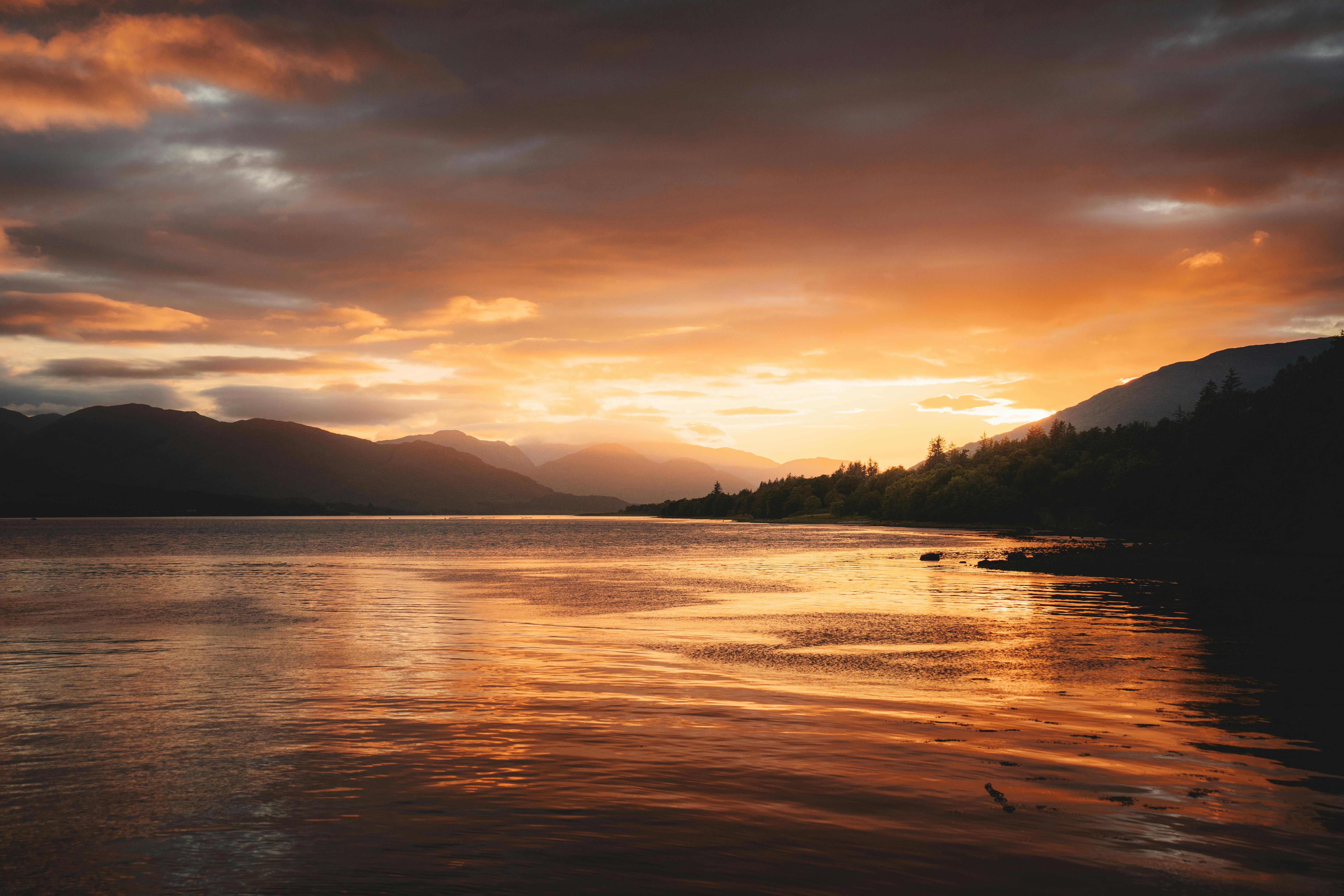 Free Serene Sunset Over Scottish Loch Stock Photo