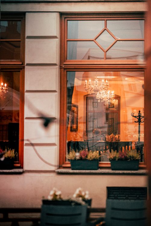 Cafe Small Window Charming Cafe Window with Warm Interior · Free Stock Photo