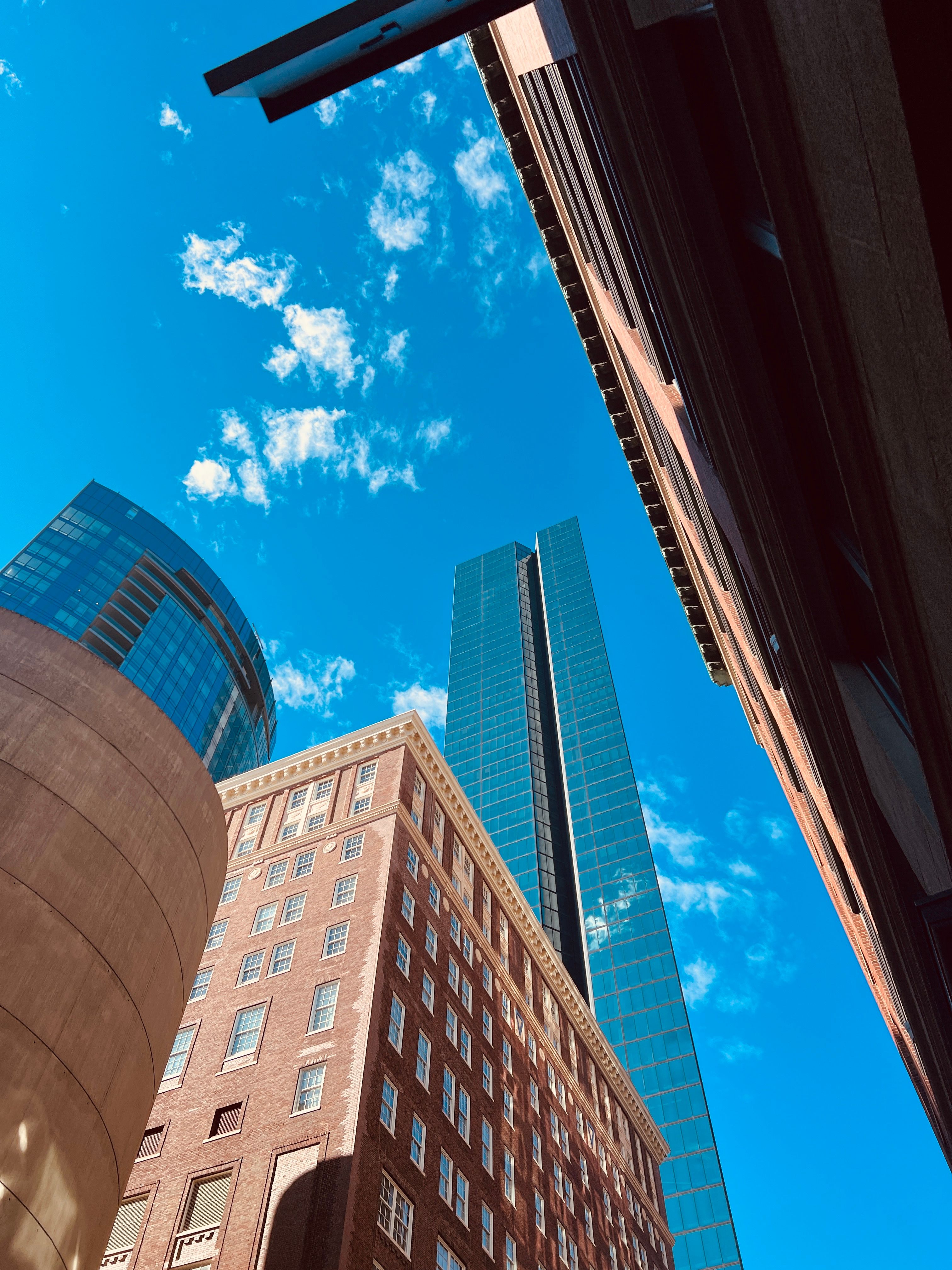 Urban Skyline with Modern and Historic Buildings · Free Stock Photo