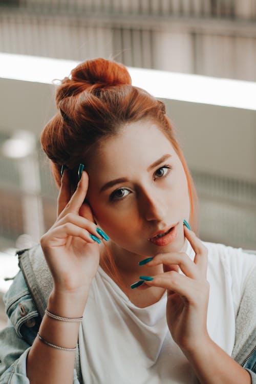 Selective Focus Portrait Photo of Woman Posing