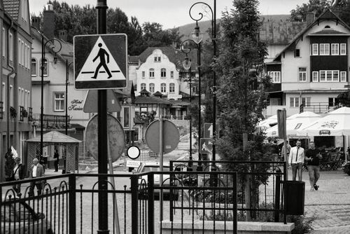 Free Quaint street scene in Świeradów-Zdrój, Poland. Captures local architecture and everyday life. Stock Photo