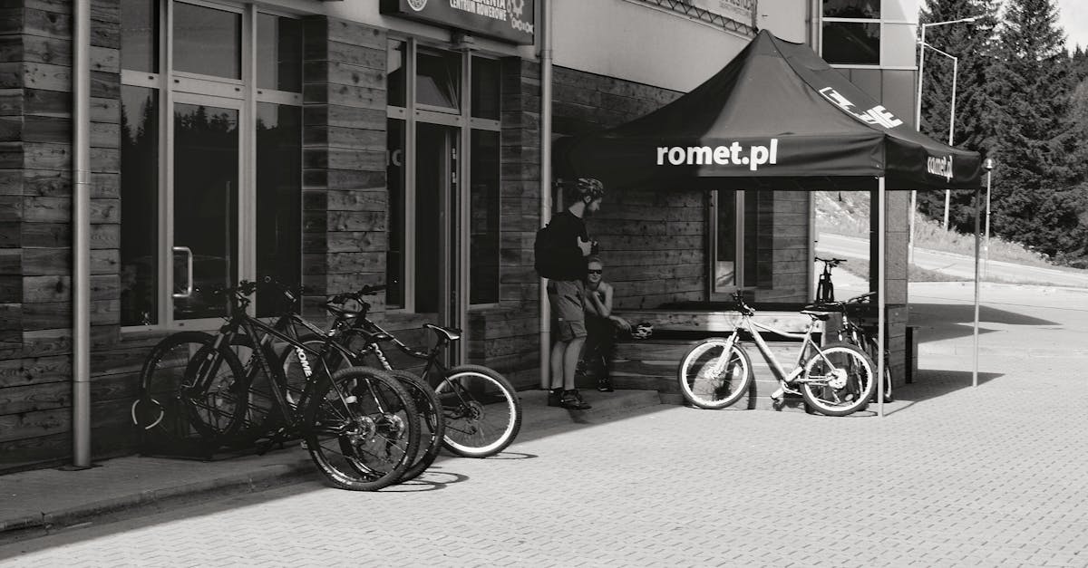 Outdoor scene with bicycles for rent at a shop in Świeradów-Zdrój, Poland.