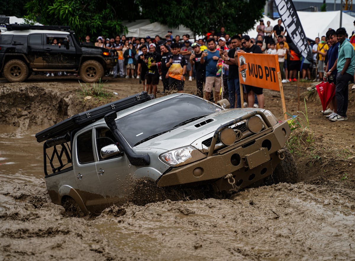 4x4 vehicle in a mud pit off-road challenge