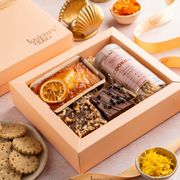Gift box packed with baked goods and sweets — Shanks Emperor on Pexels