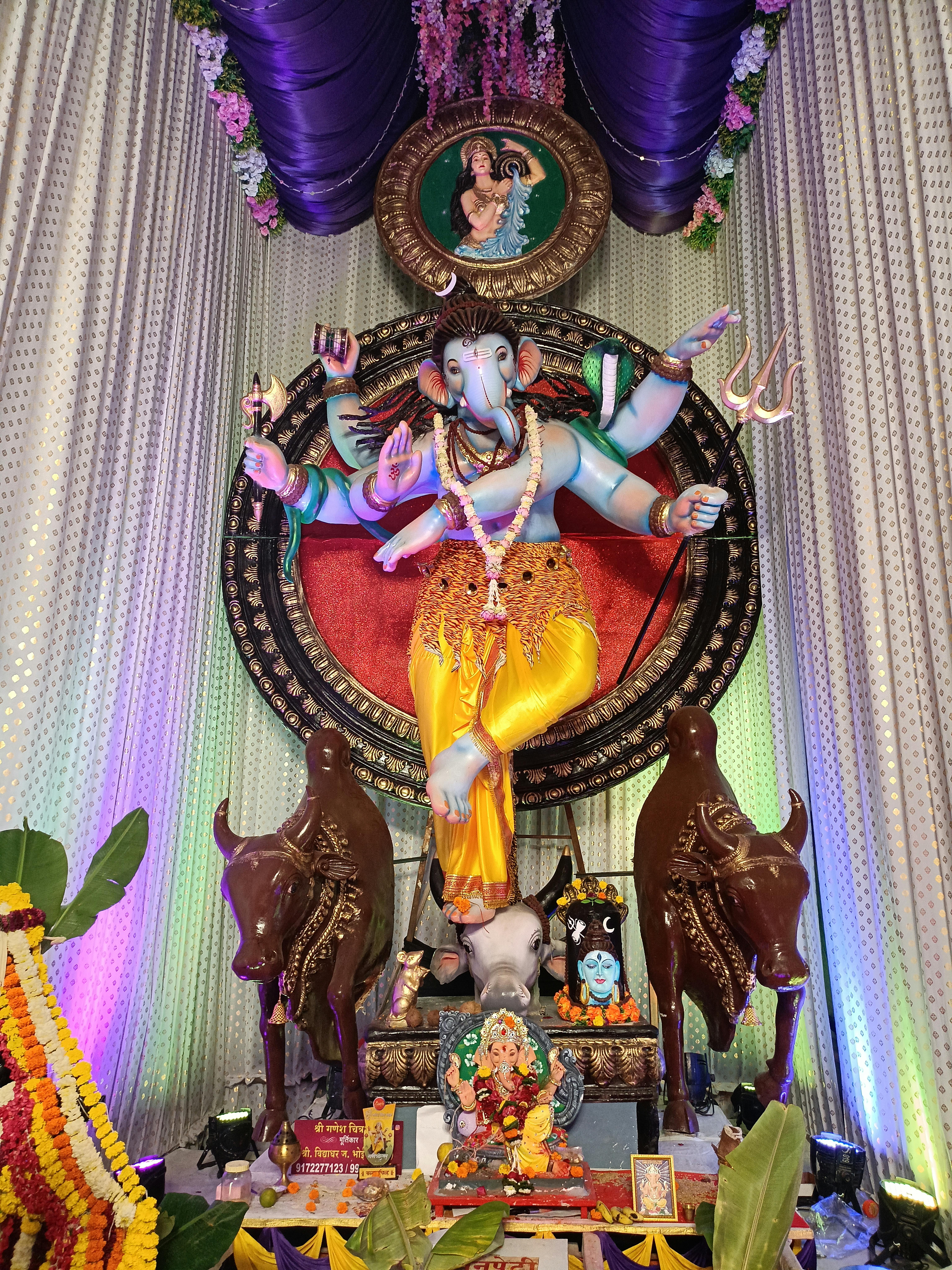 Colorful Ganesh Chaturthi idol and decoration captured in Mumbai during the festival.