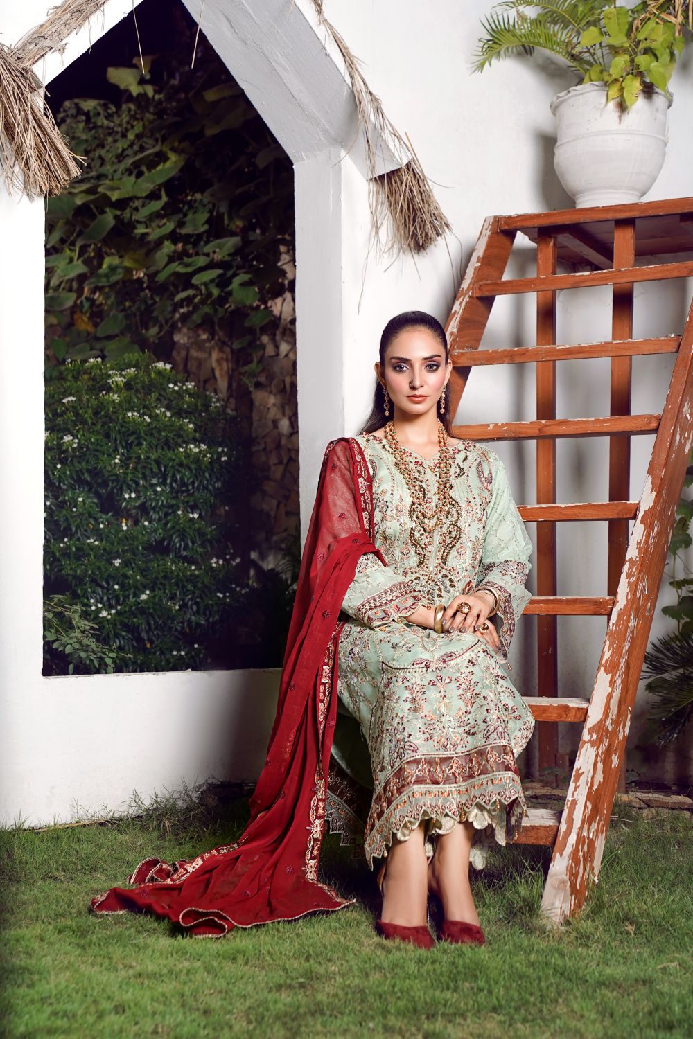 Elegant Fashion Model in Traditional Dress · Free Stock Photo