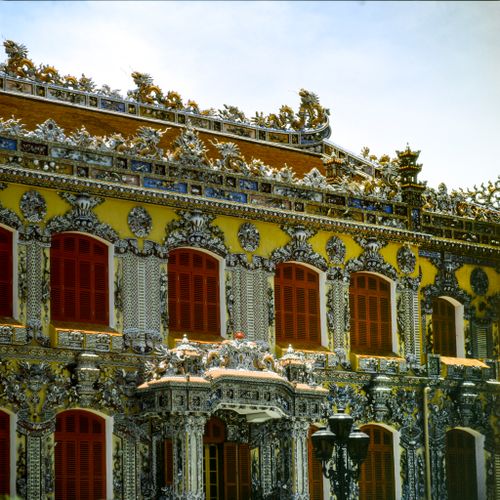 Free A richly decorated historic palace facade with intricate details and vibrant windows. Stock Photo