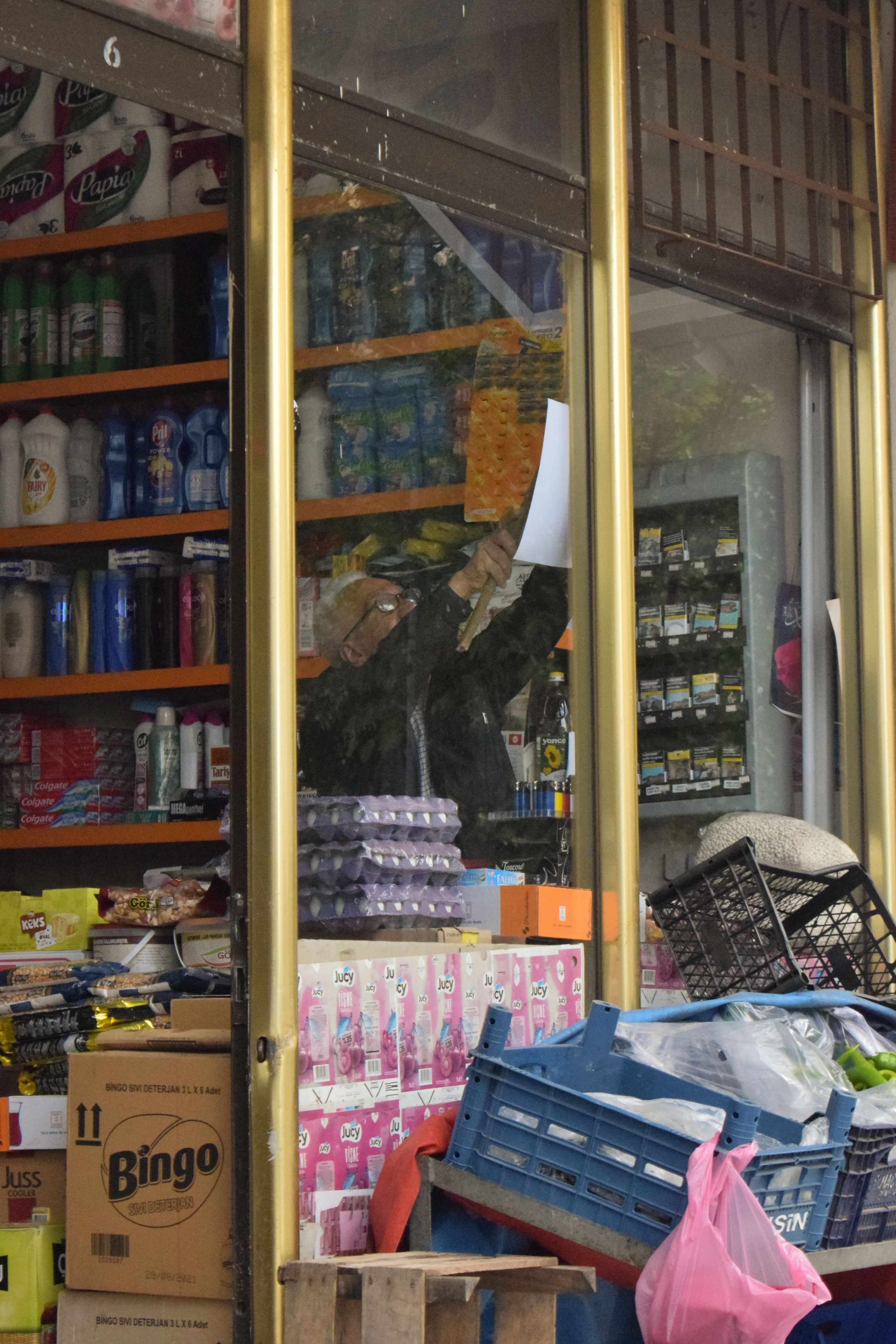Representative convenience-store shelves with everyday products