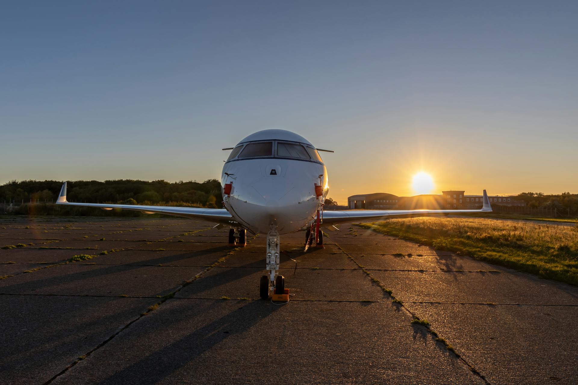 Private Jet at Sunset on Runway