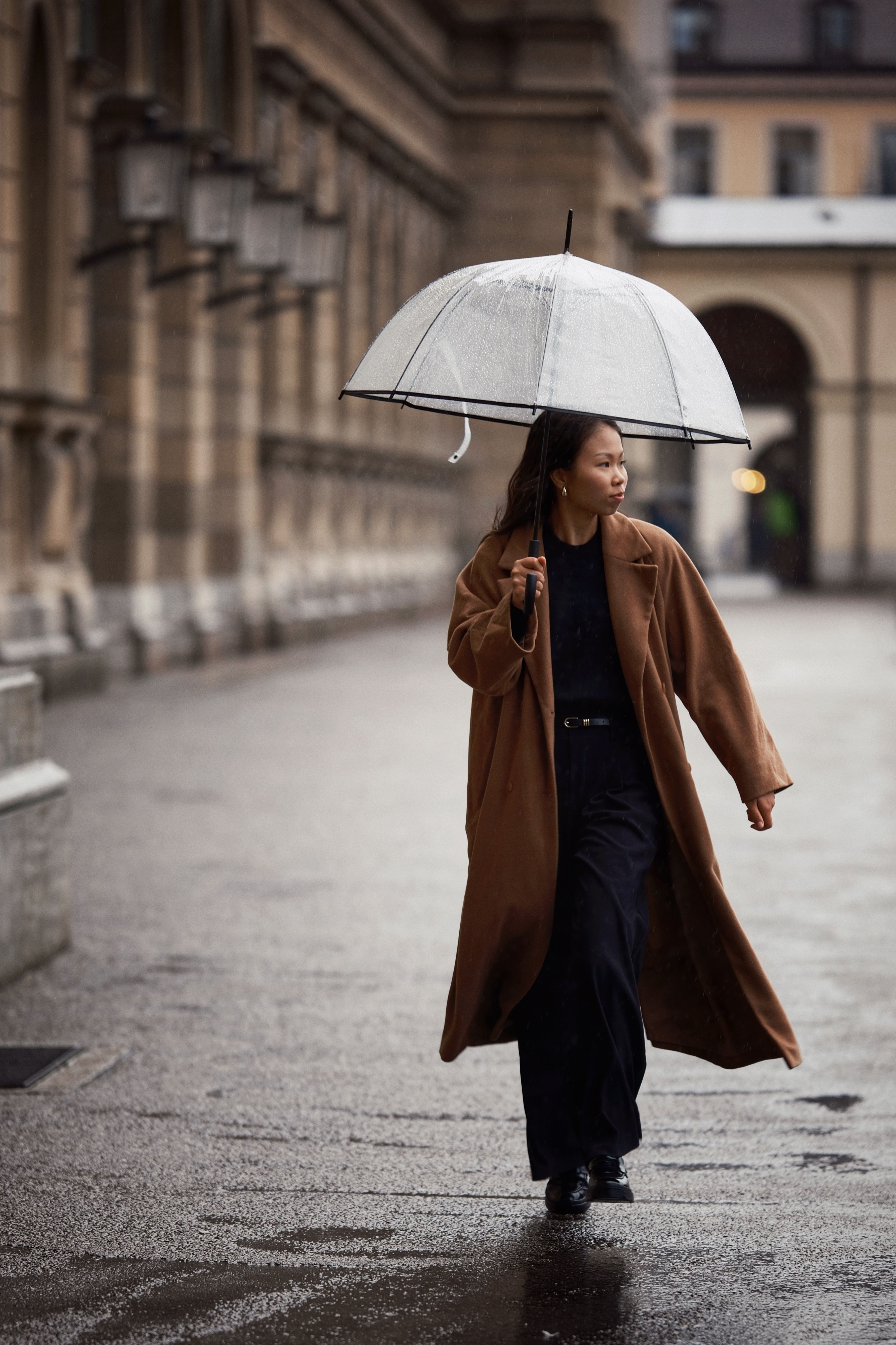 Woman Walking with Umbrella in Urban Rainy Scene · Free Stock Photo