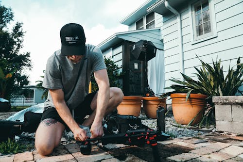 Man Fixing Camera