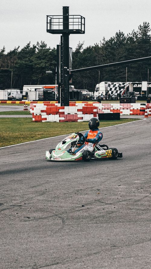 Free A thrilling go-kart race captured at Berghem Circuit in the Netherlands. Stock Photo