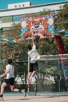 Dynamic basketball game capturing a slam dunk on a vibrant court in Brasília.