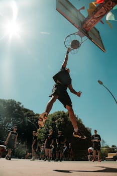 An exciting moment of a basketball player dunking outdoors in Brasília, Brazil.