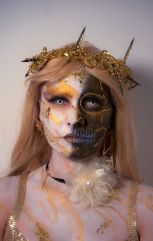 Captivating portrait featuring half skull and gold face paint with spiked crown.