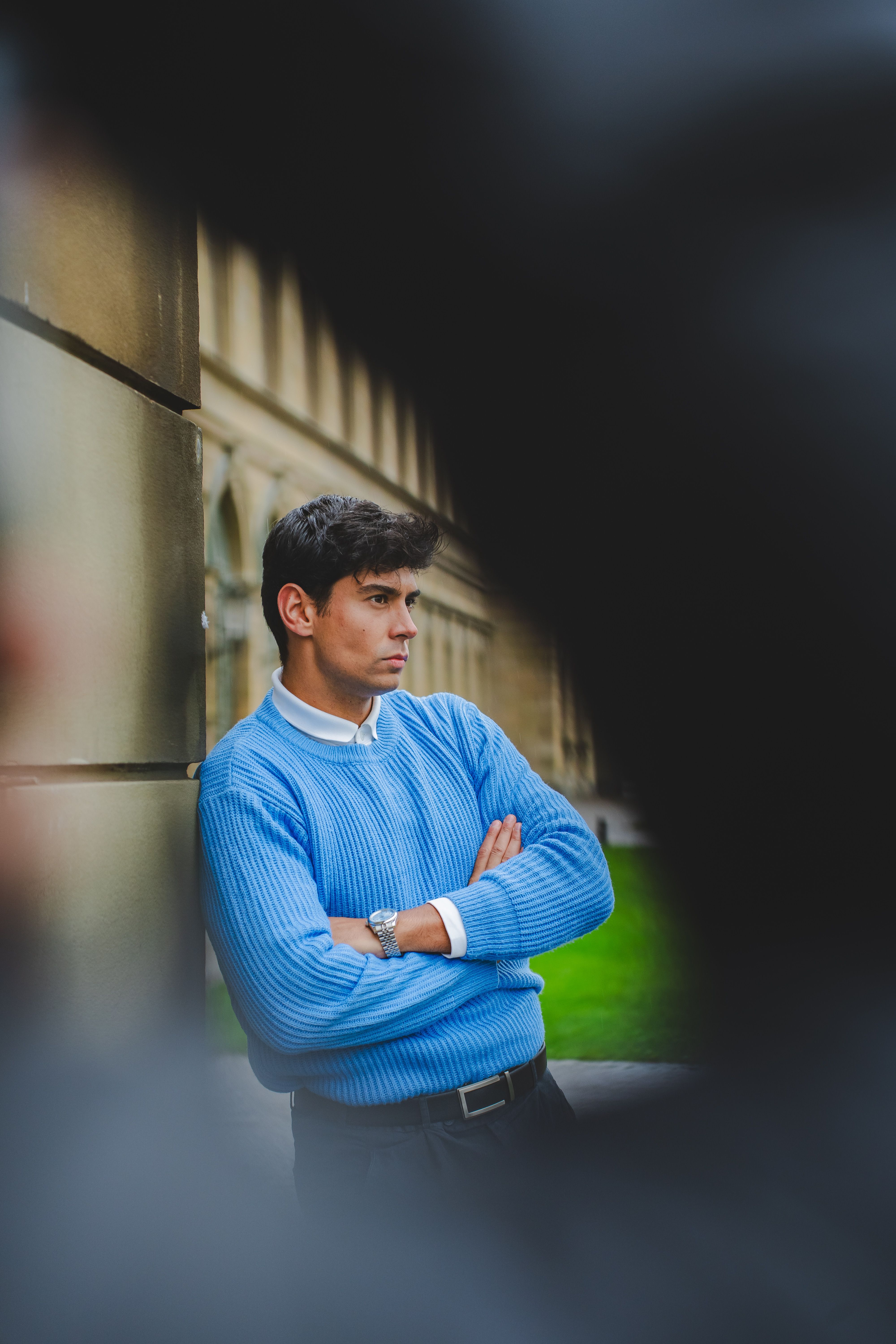 Stylish Man Posing in Munich's Historic Architecture · Free Stock Photo