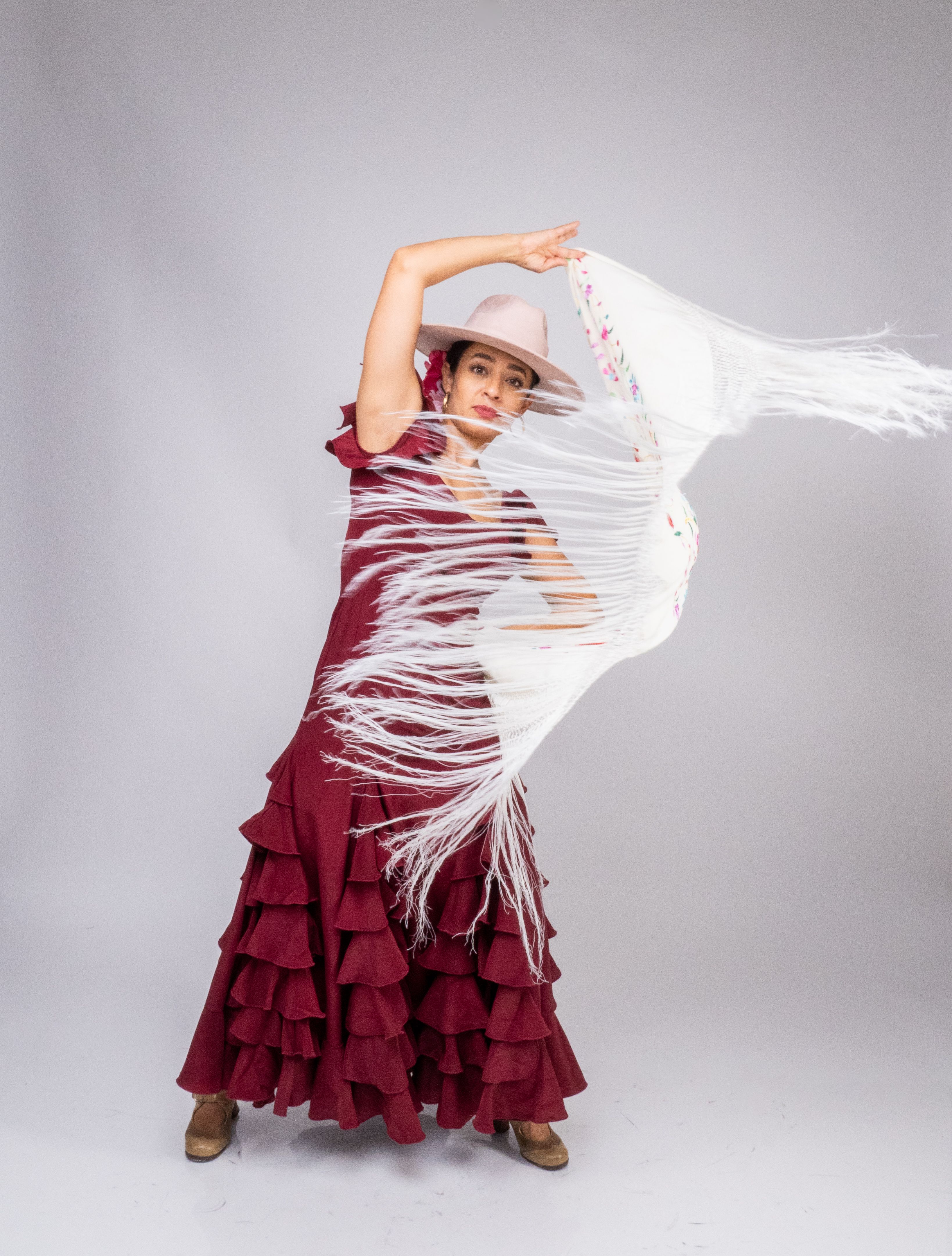 Elegant Flamenco Dancer in Burgundy Dress  Free Stock Photo