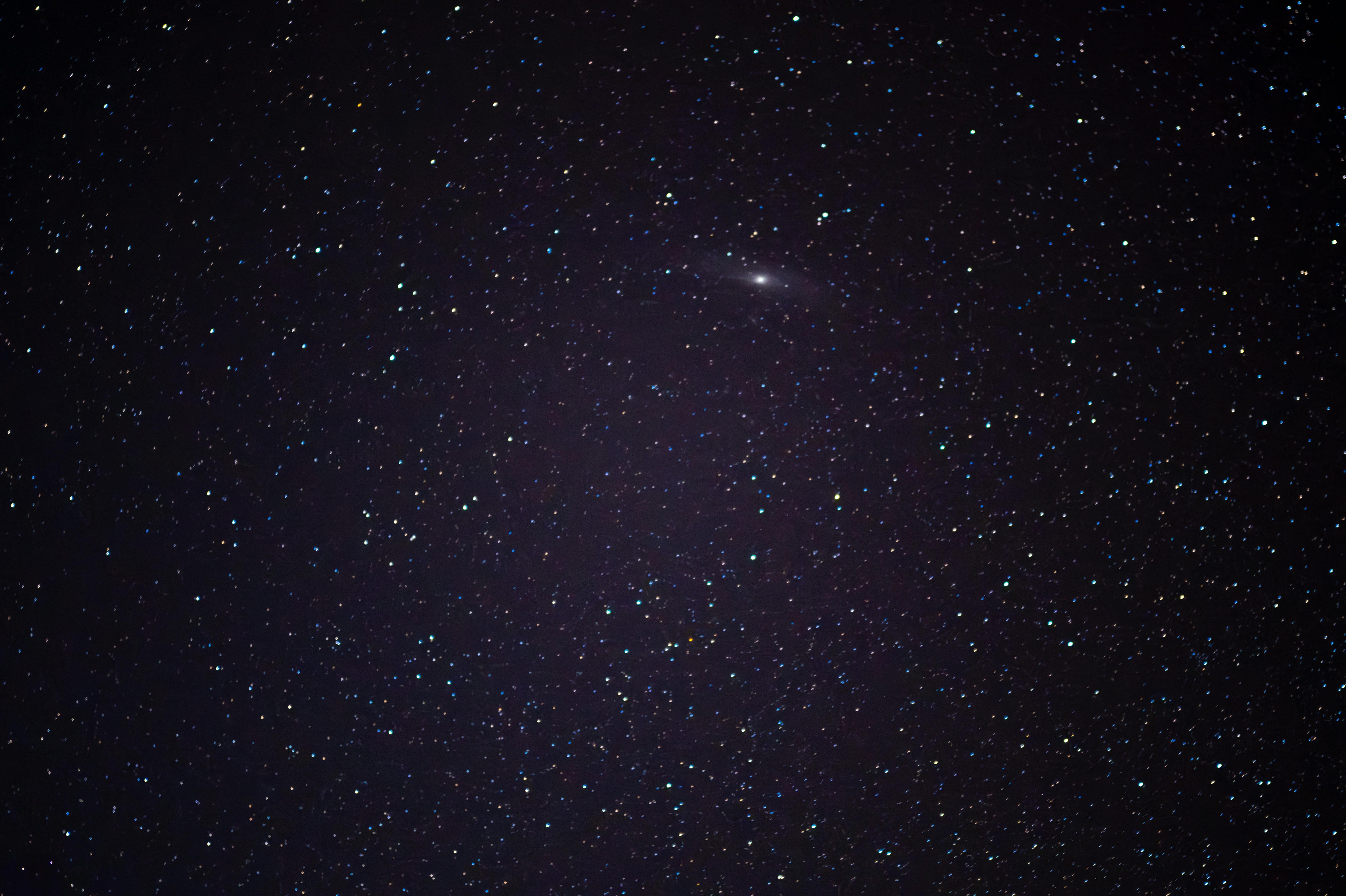 A mesmerizing view of the star-filled night sky featuring the Andromeda Galaxy.