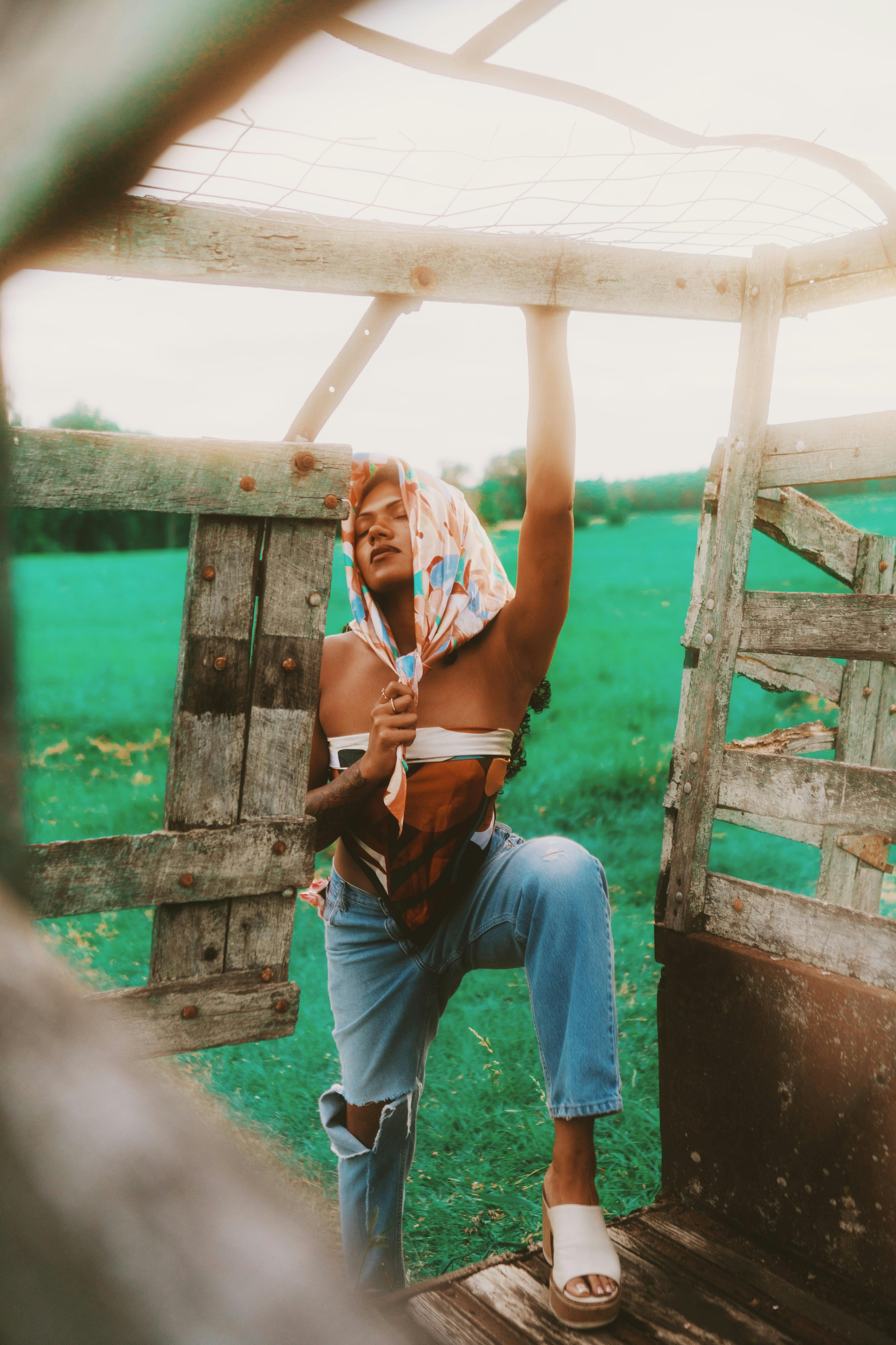 fashionable woman in rustic outdoor setting