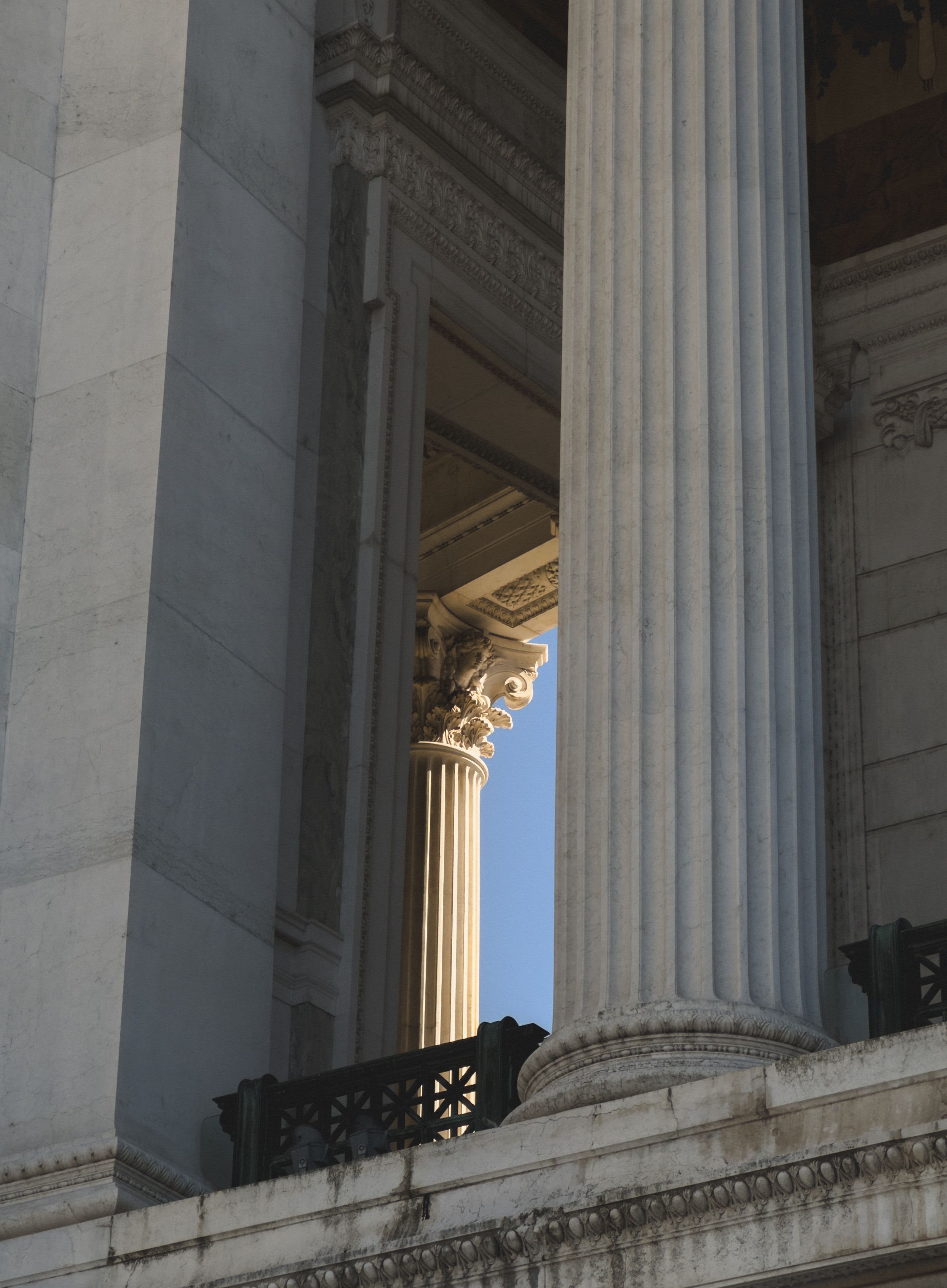 Majestic Neoclassical Columns with Sky View · Free Stock Photo
