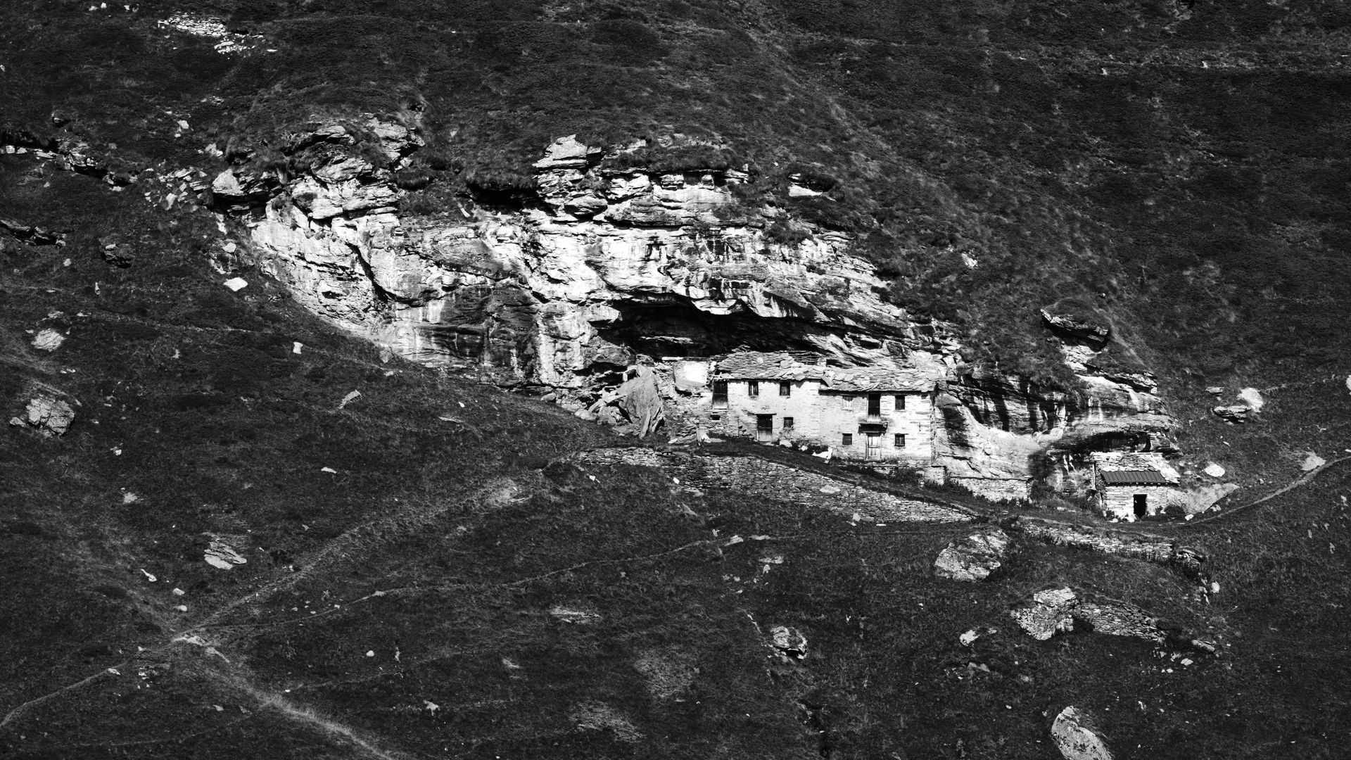 Ancient Stone House Nested in Rocky Italian Landscape