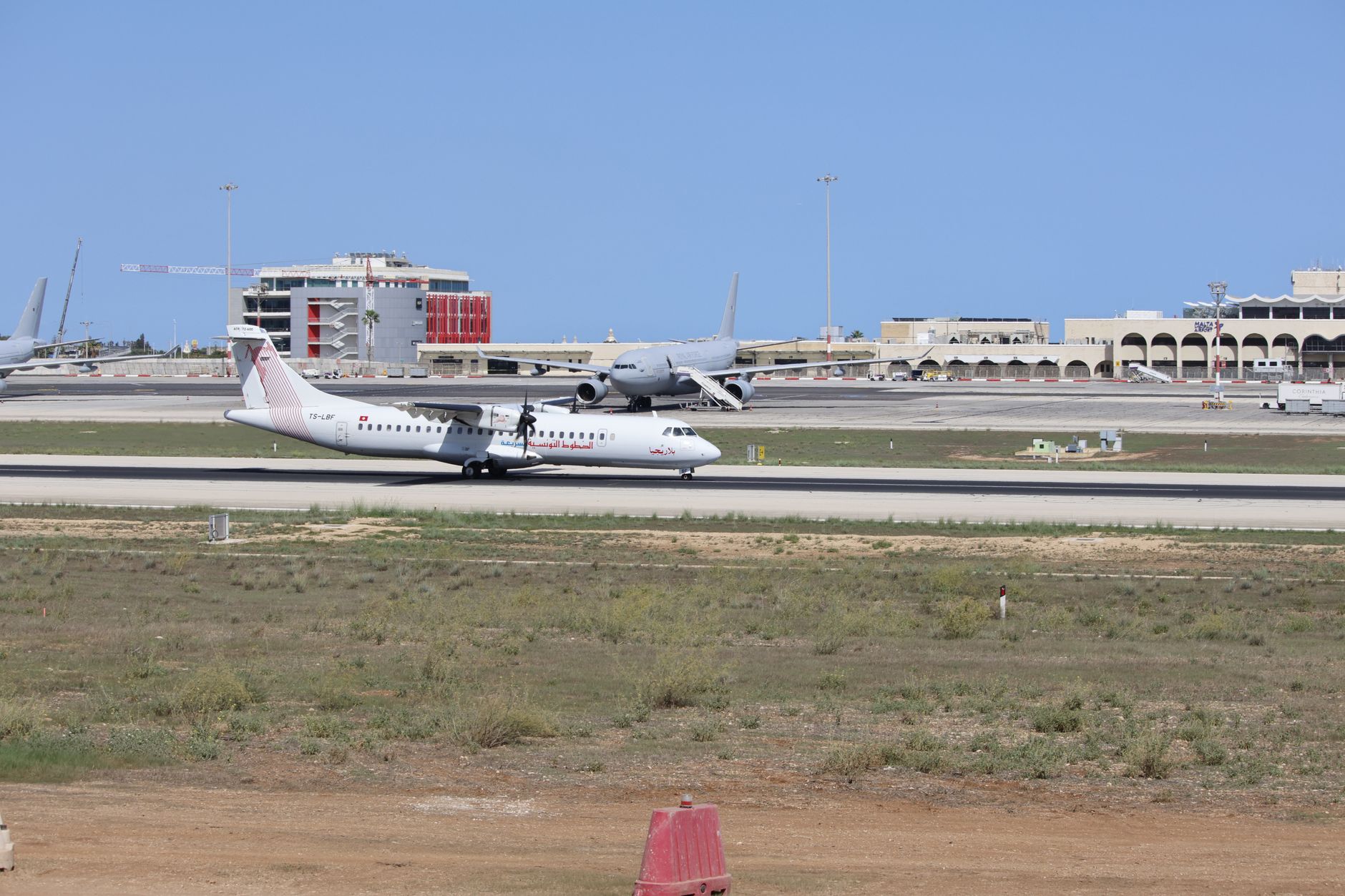 Santorini airport with planes on the runway
