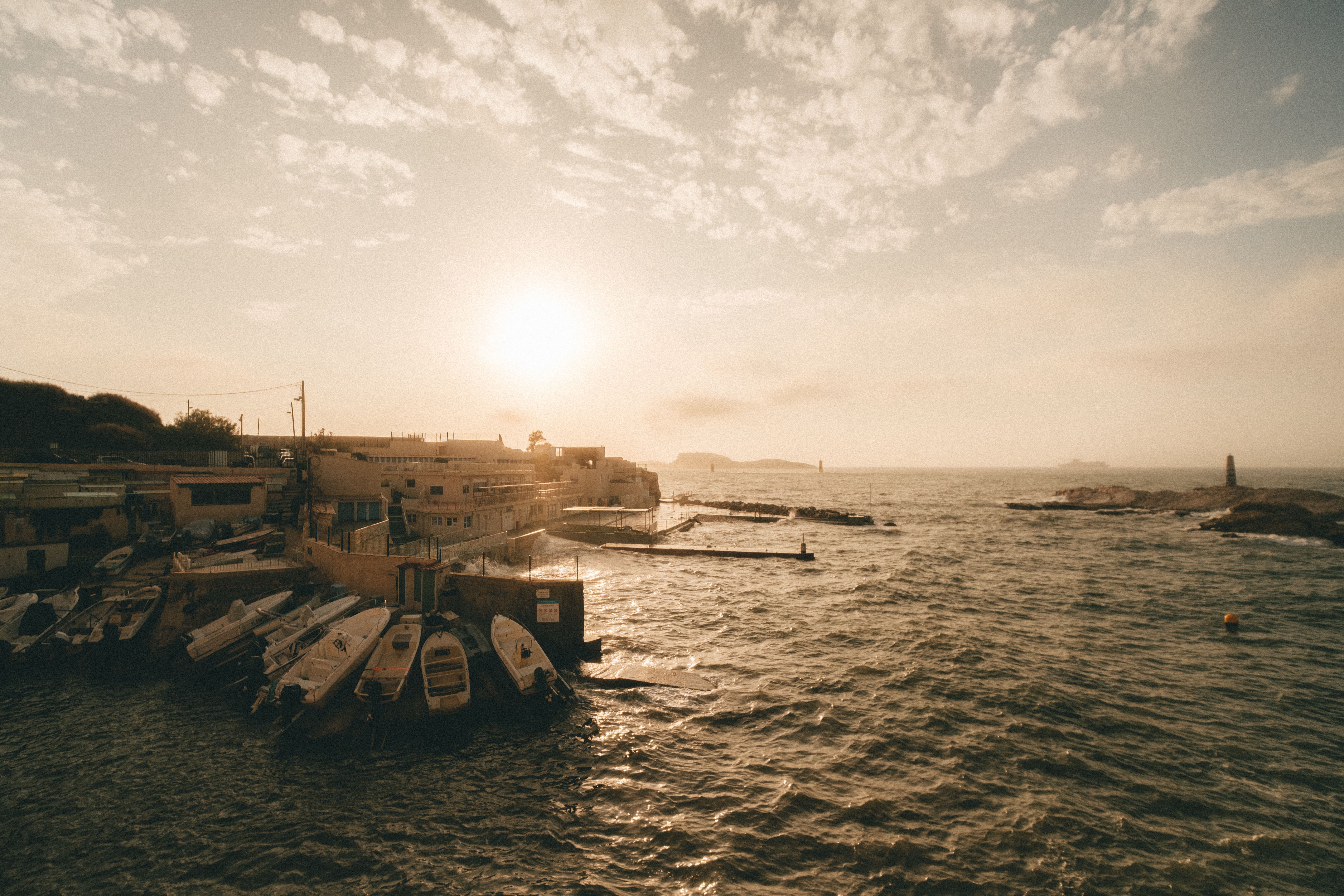 Ibiza boat tours at sunset with golden hues over the sea