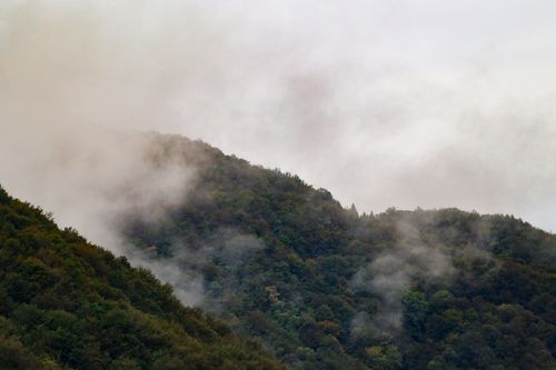 Layered hills in morning haze — photo by Nikola Toma&scaron;i&cacute; on Pexels
