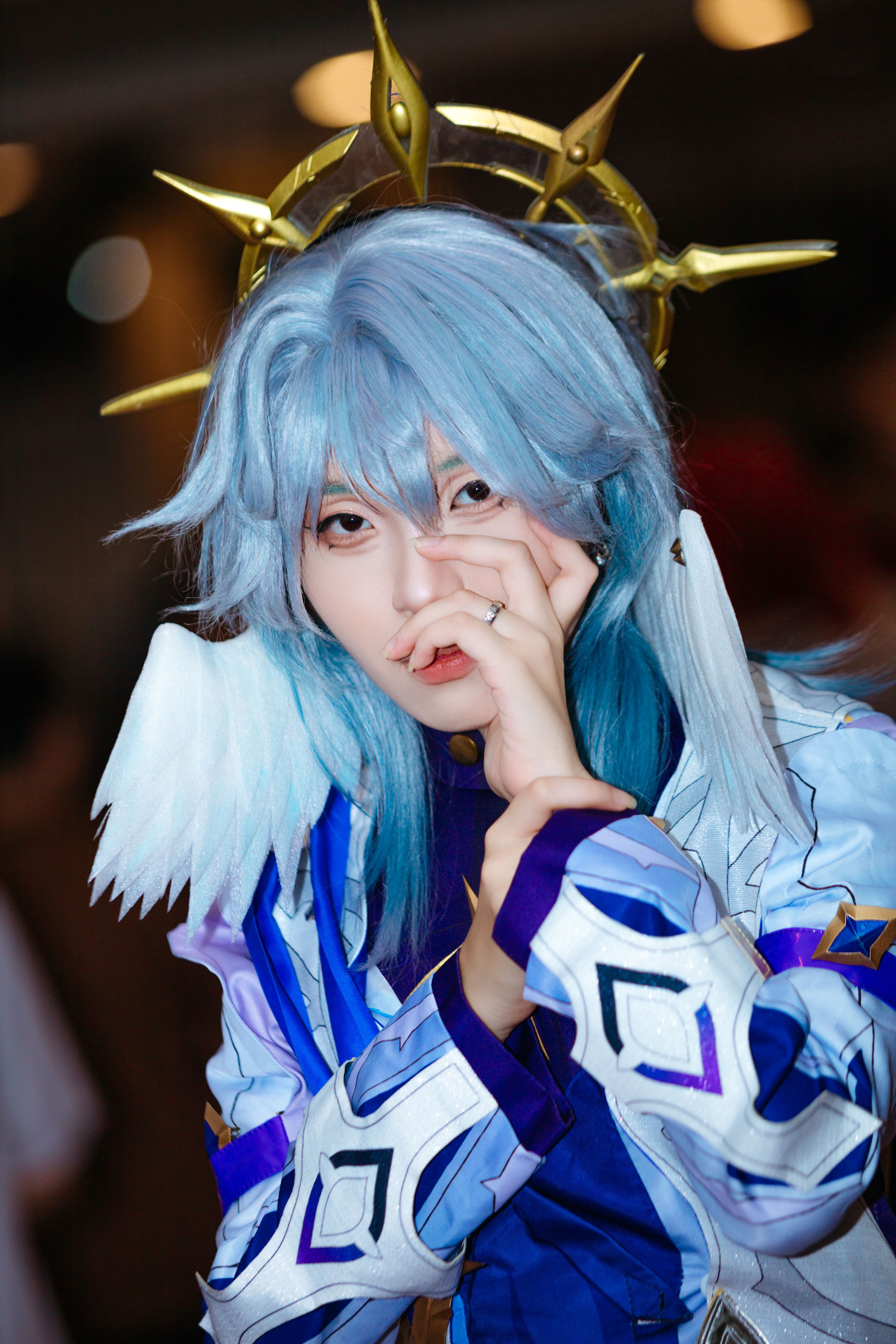 Dramatic Cosplay Portrait with Blue and Gold Accents