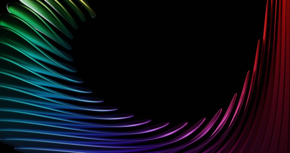 Vibrant abstract image featuring colorful curved lines on a black background.