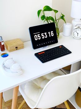 Bright and modern home office setup with minimalist decor and natural light.