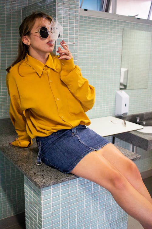 Free Photo Of Woman Smoking Cigarette Stock Photo