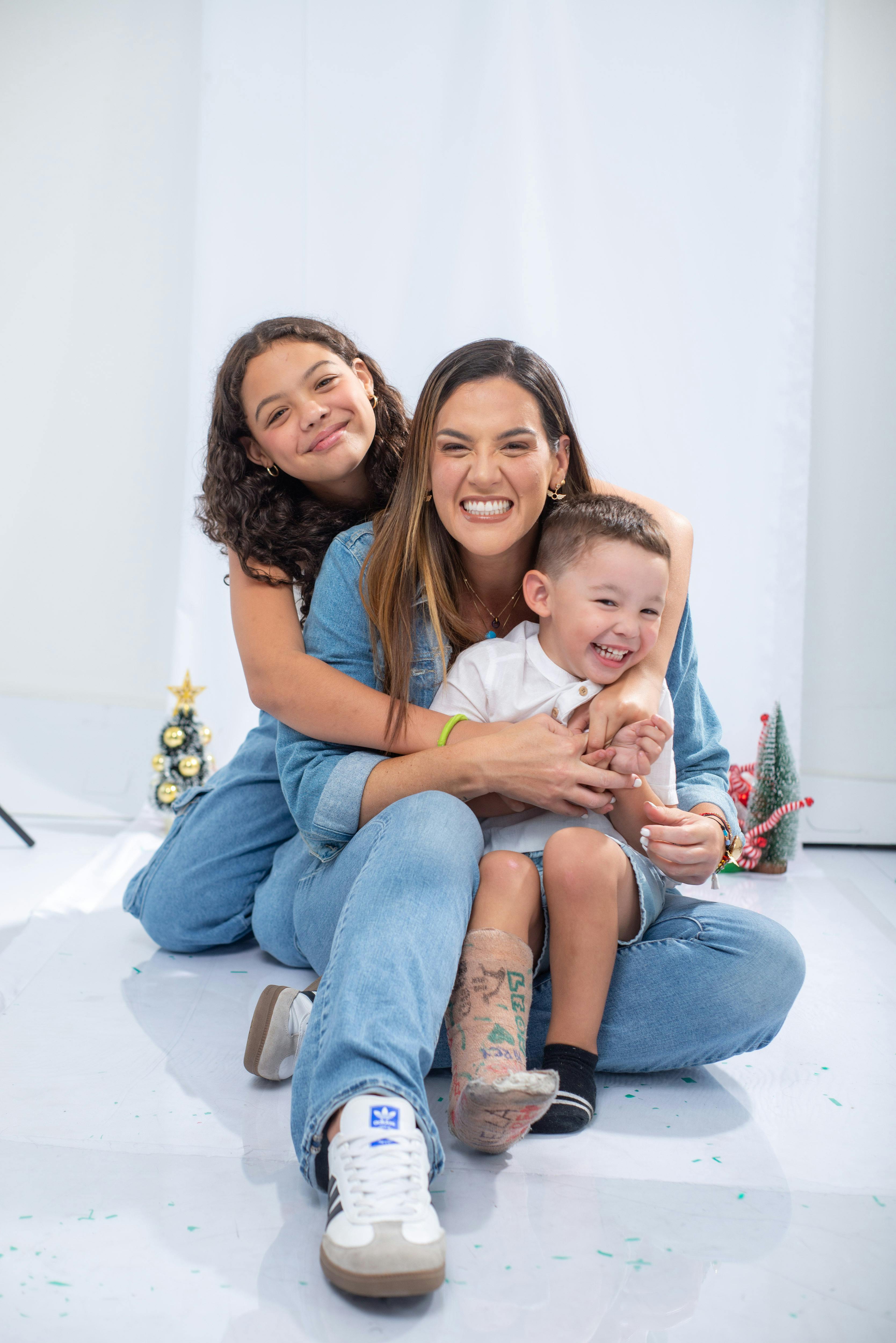 happy family christmas portrait in studio setting