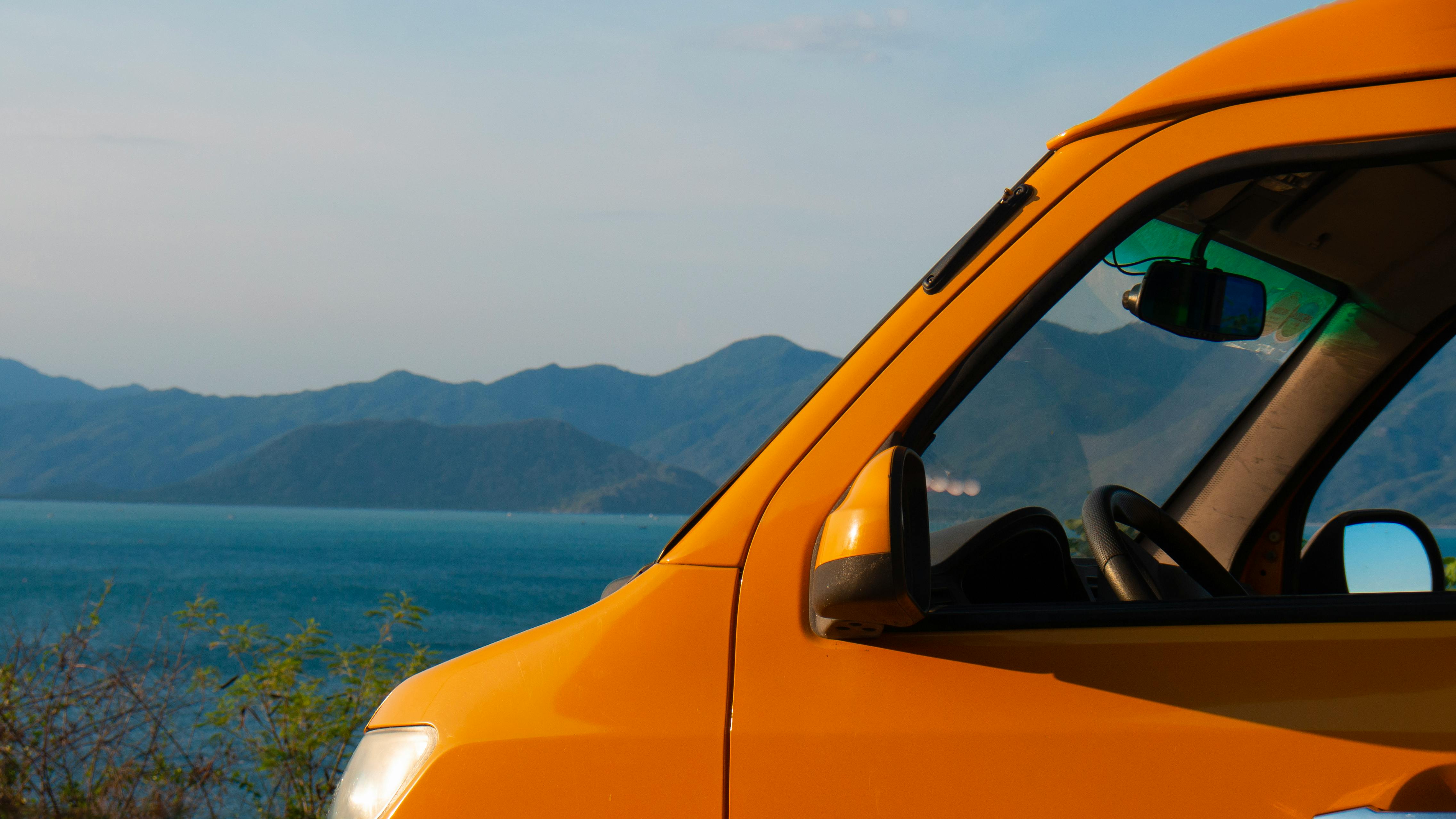 yellow van overlooking scenic ocean view