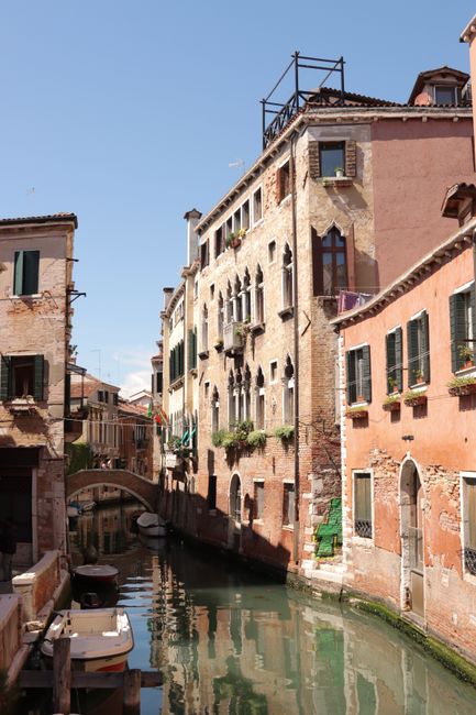 Capture the essence of Venice with this stunning canal view and traditional Venetian architecture.