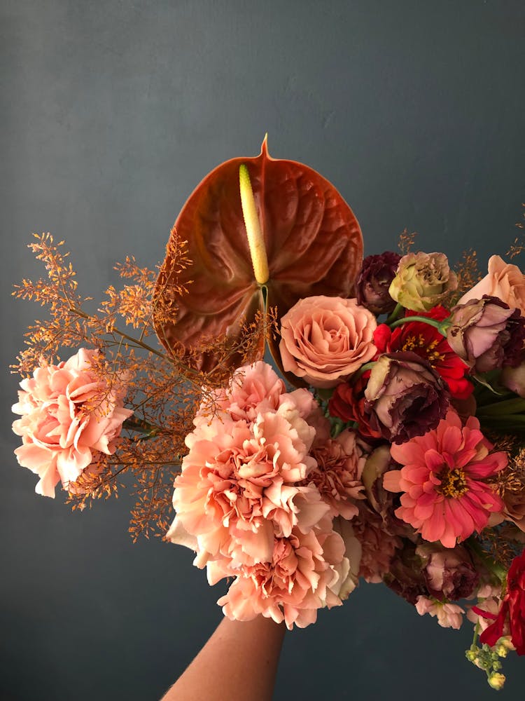 Crop Person With Fresh Flower Bouquet