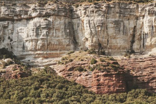 Free Explore the stunning geological formations and sandstone cliffs of Vic, Spain, offering a scenic outdoor vista. Stock Photo