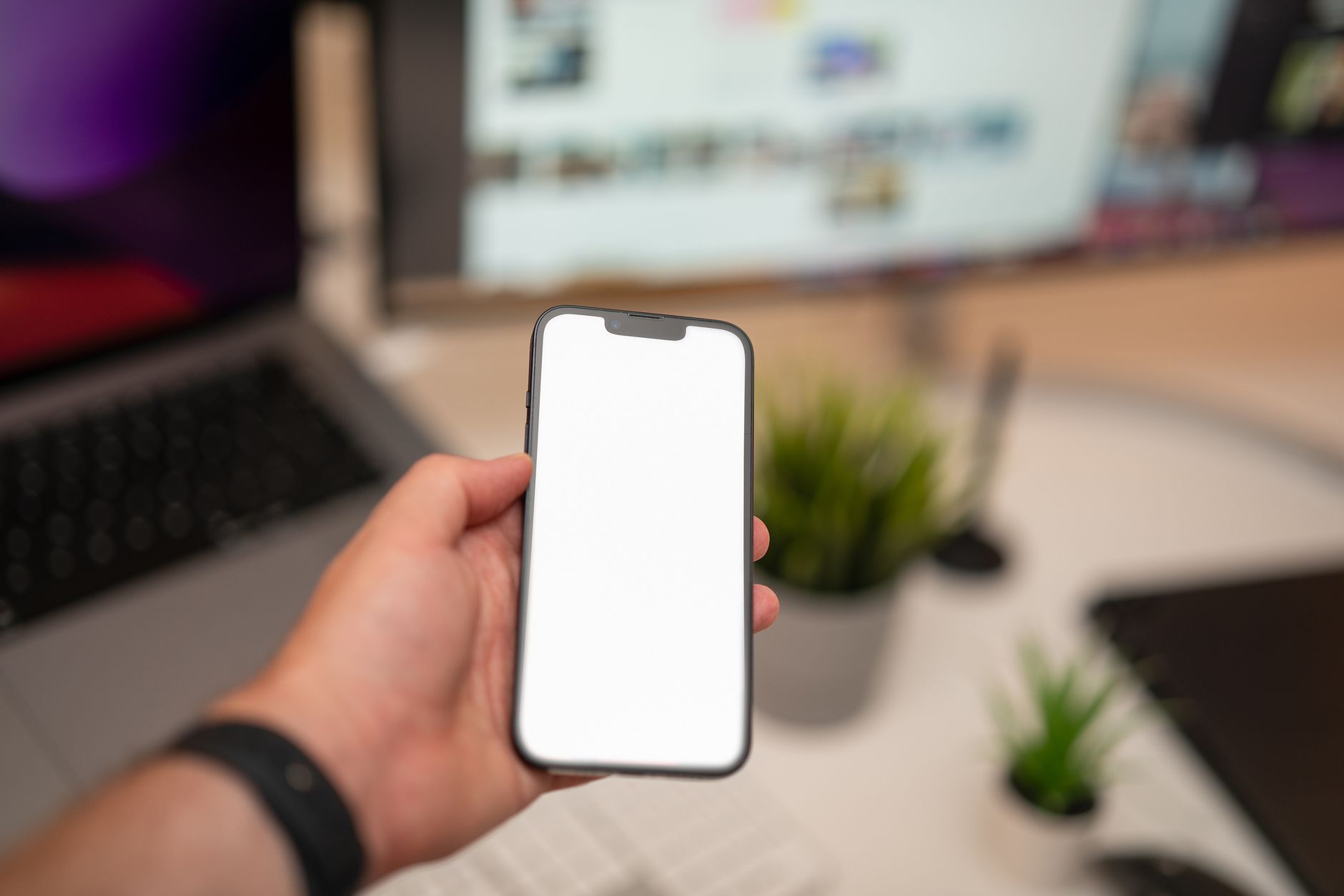 Smartphone displaying an incoming call screen on a desk, representing how an AI receptionist answers business calls