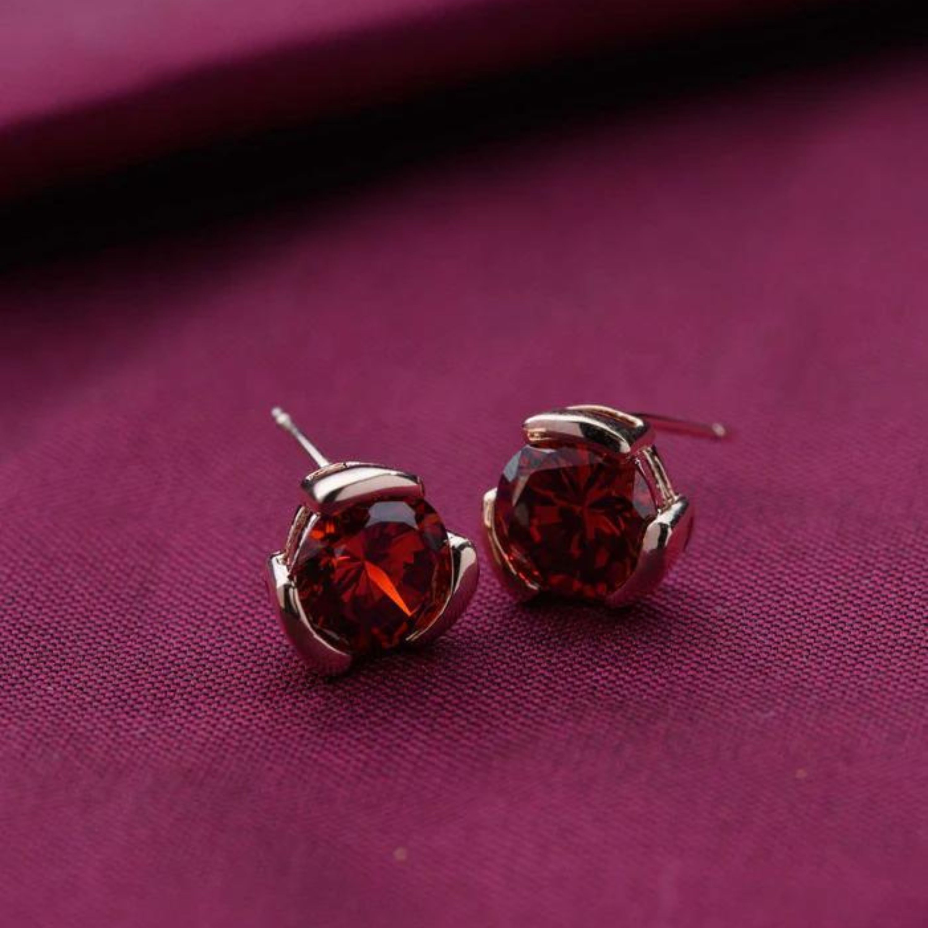 Deep red stone studs — photo by Shanks Emperor on Pexels