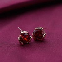 Deep red stone studs — photo by Shanks Emperor on Pexels