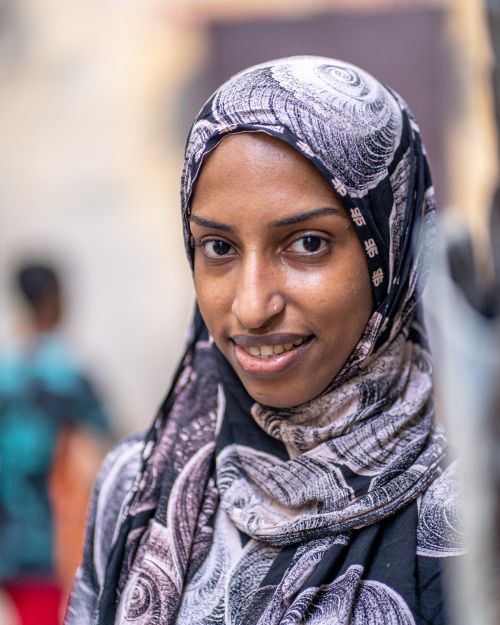 Free Muslim Woman in Hijab walking on the Capital Streets in Mogadishu Somalia  Stock Photo