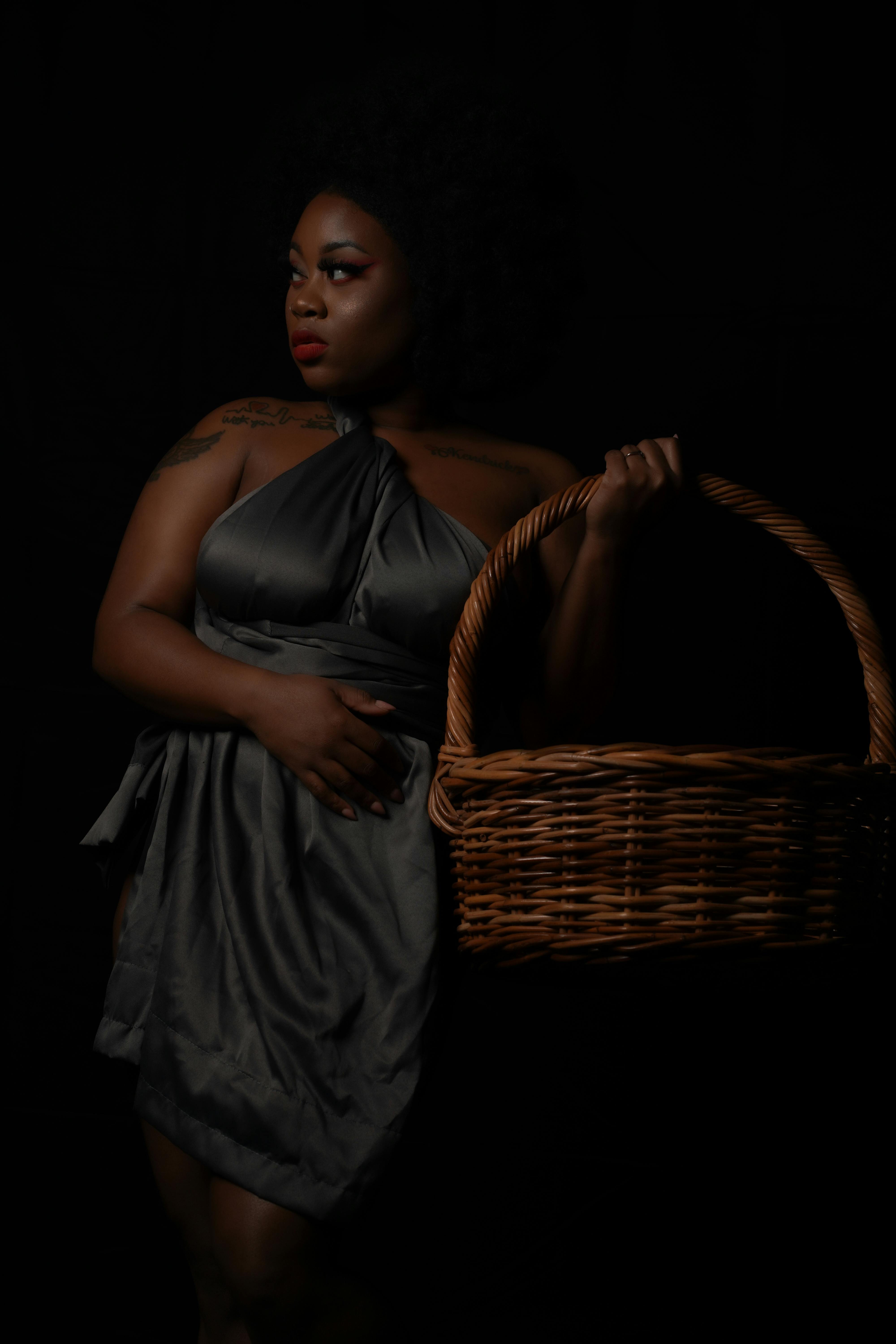 dramatic portrait of woman with basket